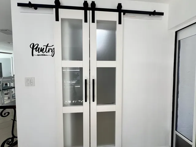 a bathroom with a granite countertop toilet a sink and a bathtub