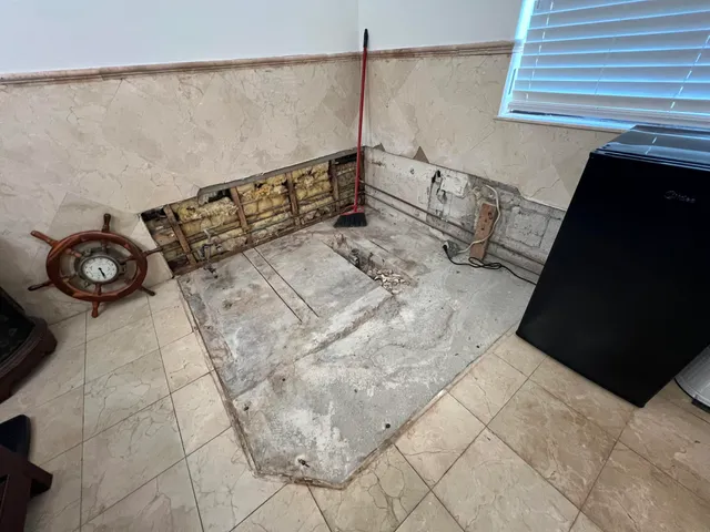 a view of balcony with wooden floor and outdoor seating