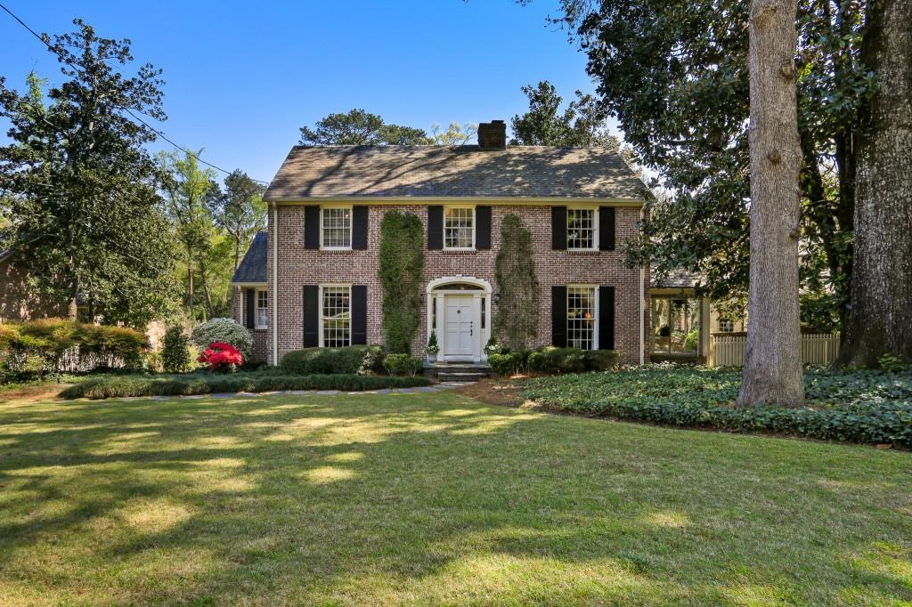 3111 Arden Road Northwest Atlanta, GA 30305 - Photo 1 of 1 a front view of a house with a yard