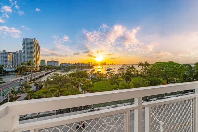 a view of a balcony with city