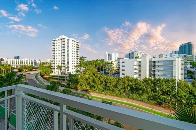 a view of a city skyline from a balcony