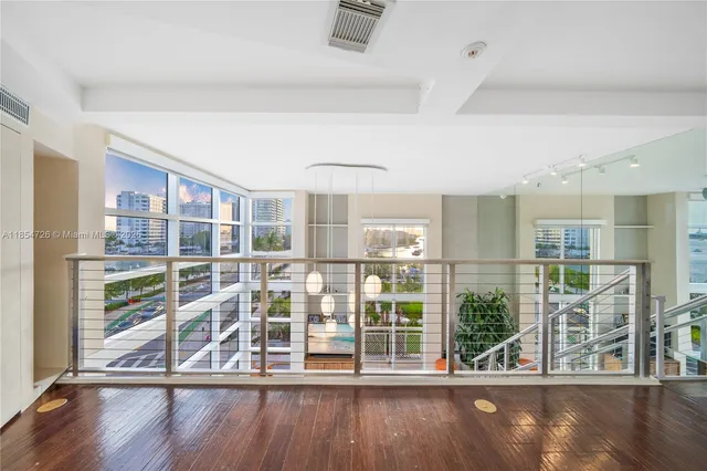 a view of a living room and entry way