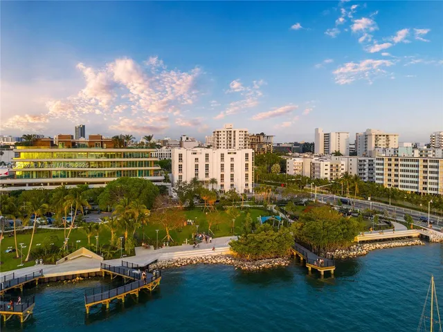 a view of a lake with a city