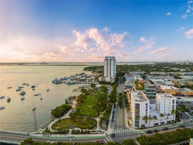 a view of a city with tall buildings