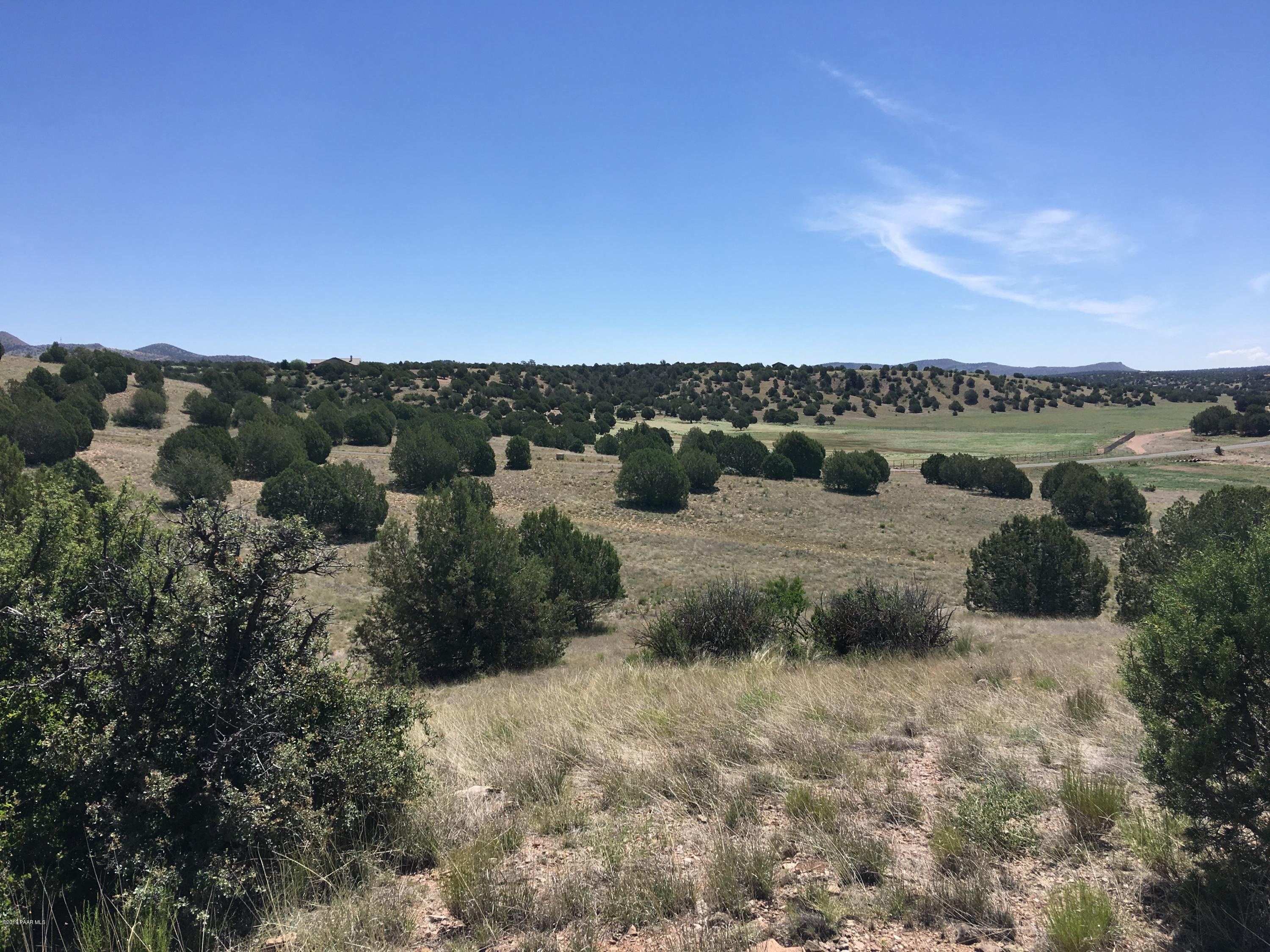 8201 Dillon Wash Road Prescott, AZ 86305 - Photo 12 of 18 a view of a dry yard with wooden fence