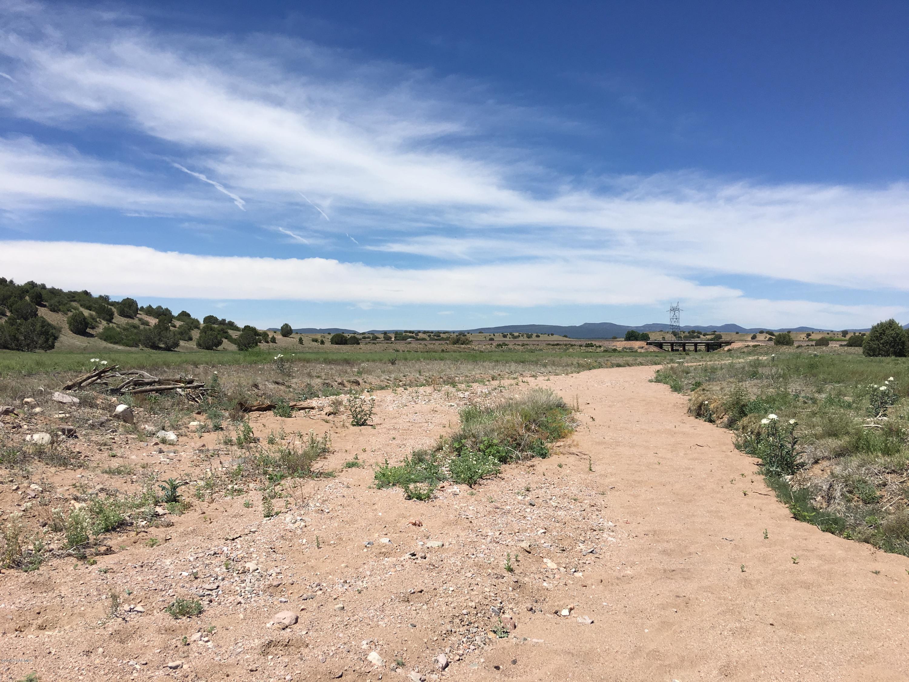 8201 Dillon Wash Road Prescott, AZ 86305 - Photo 16 of 18 a view of a lake with a beach