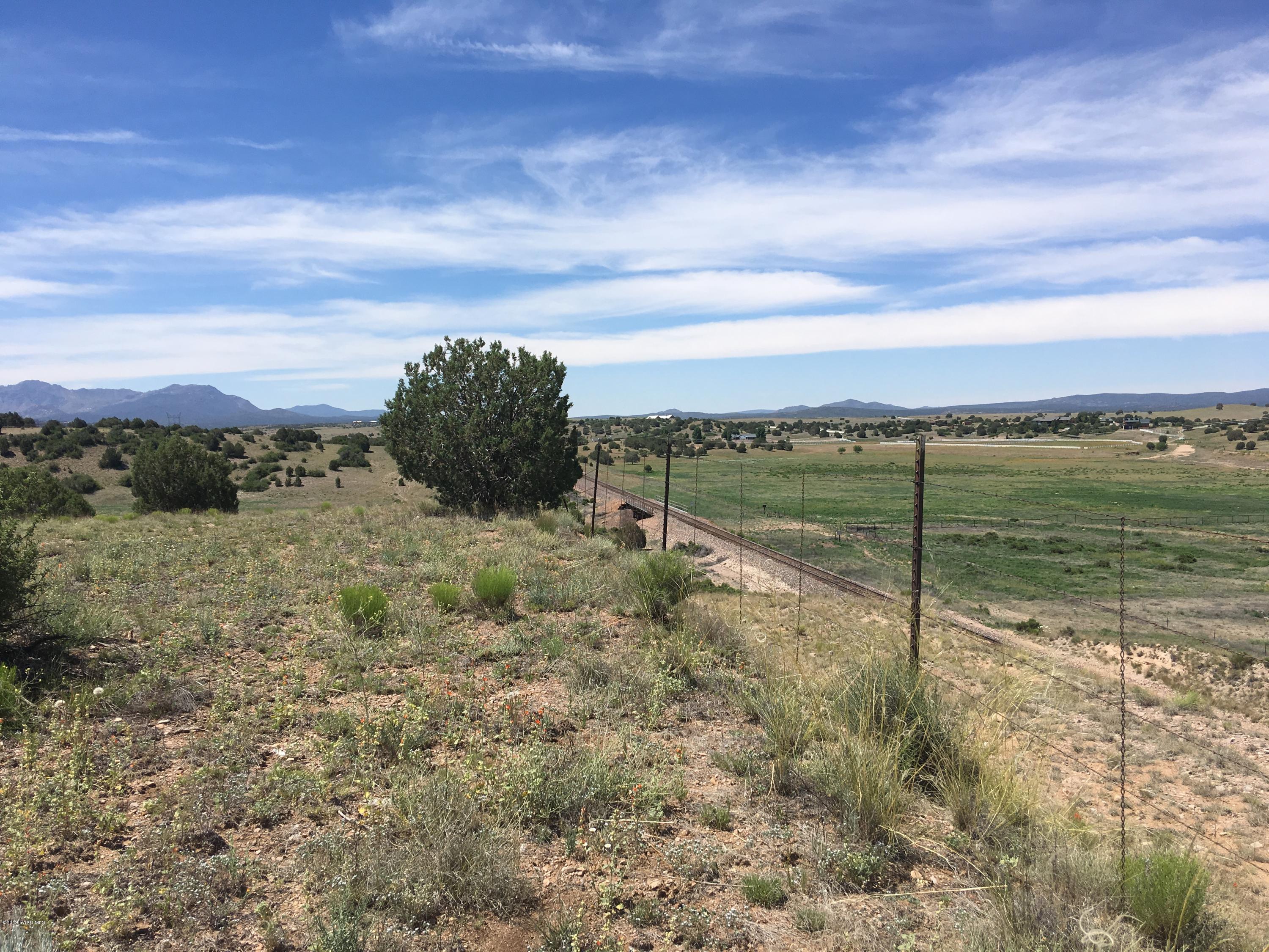 8201 Dillon Wash Road Prescott, AZ 86305 - Photo 9 of 18 a view of a yard with an ocean view