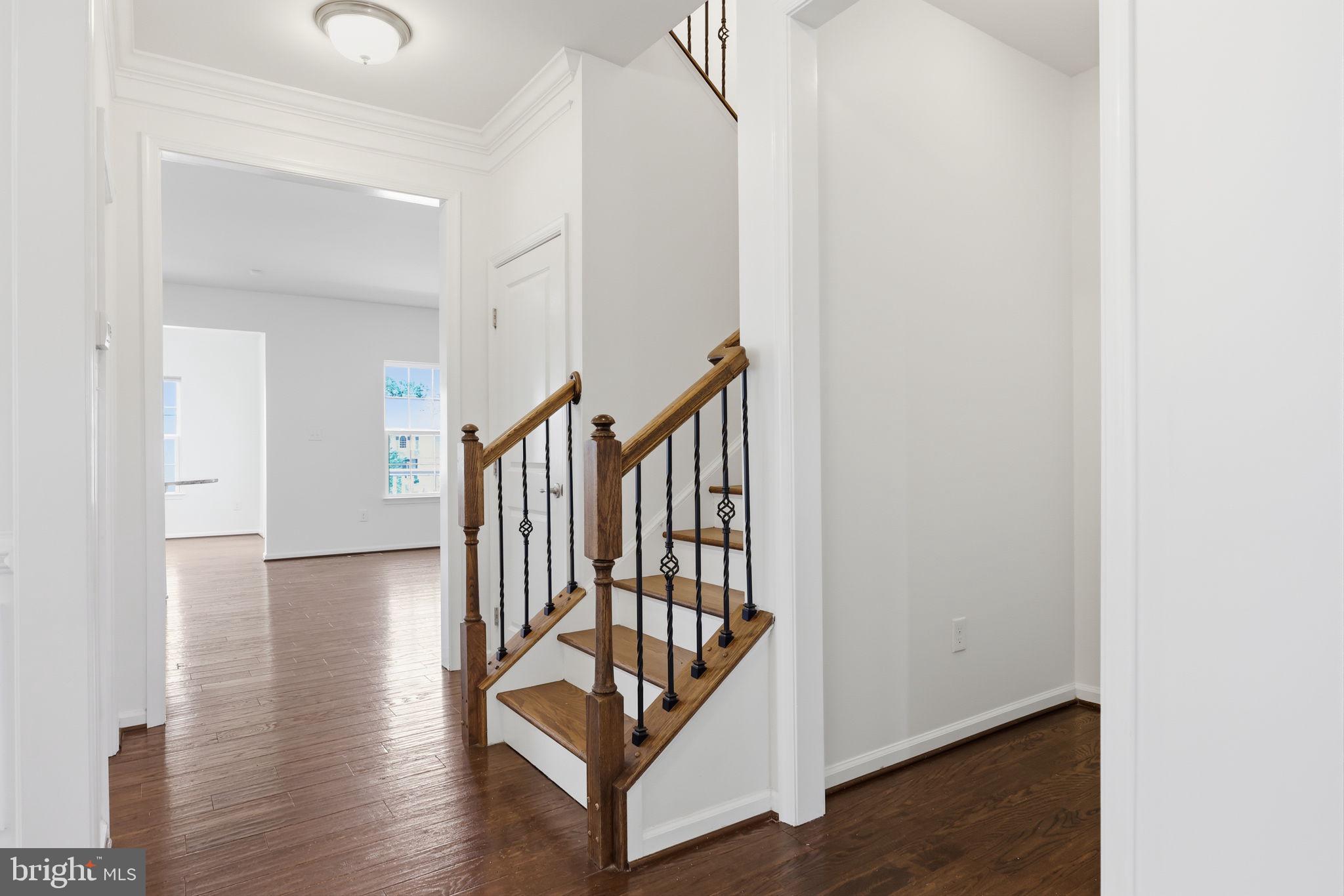 7 Montella Circle Pottstown, PA 19464 - Photo 27 of 61 Hardwood stairs with iron balusters