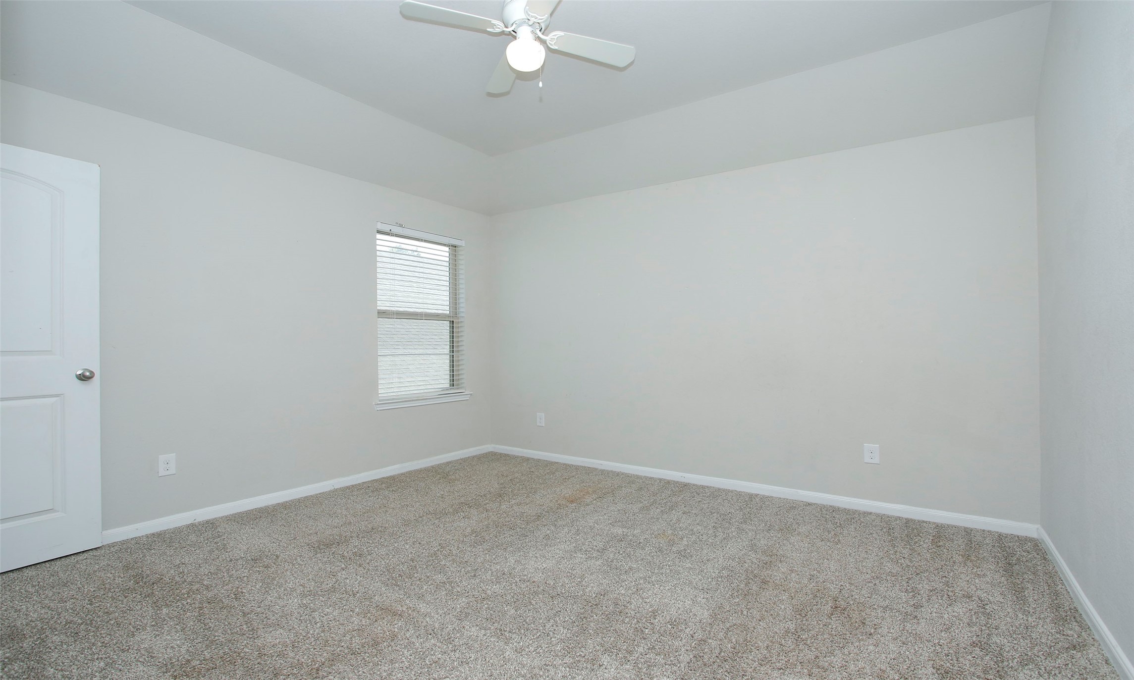 14120 Sand Ridge Court Conroe, TX 77384 - Photo 33 of 43 an empty room with a window