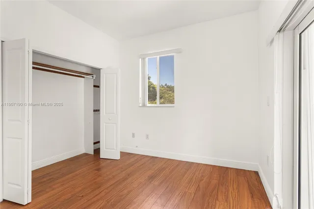a view of kitchen with wooden floor
