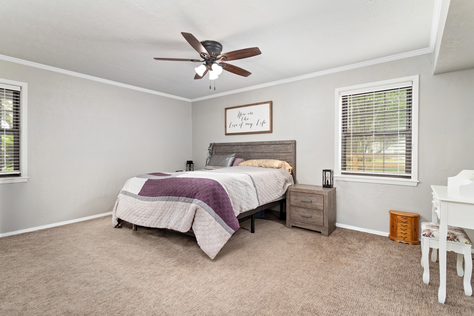 1747 Farm To Market Road 365 Nome, TX 77629 - Photo 16 of 24 a spacious bedroom with a bed and a window