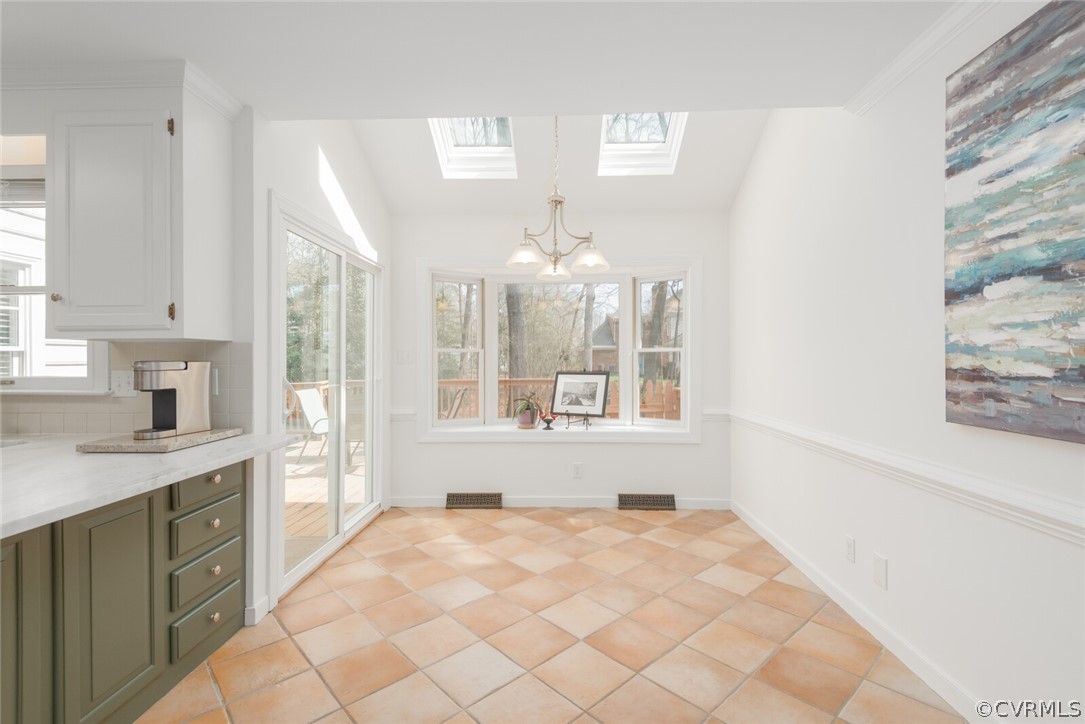 5701 North Chase Road Midlothian, VA 23112 - Photo 23 of 49 Breakfast room with skylights and large bay window