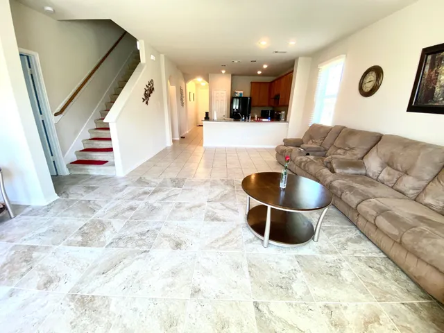 a view of kitchen and dining area with furniture