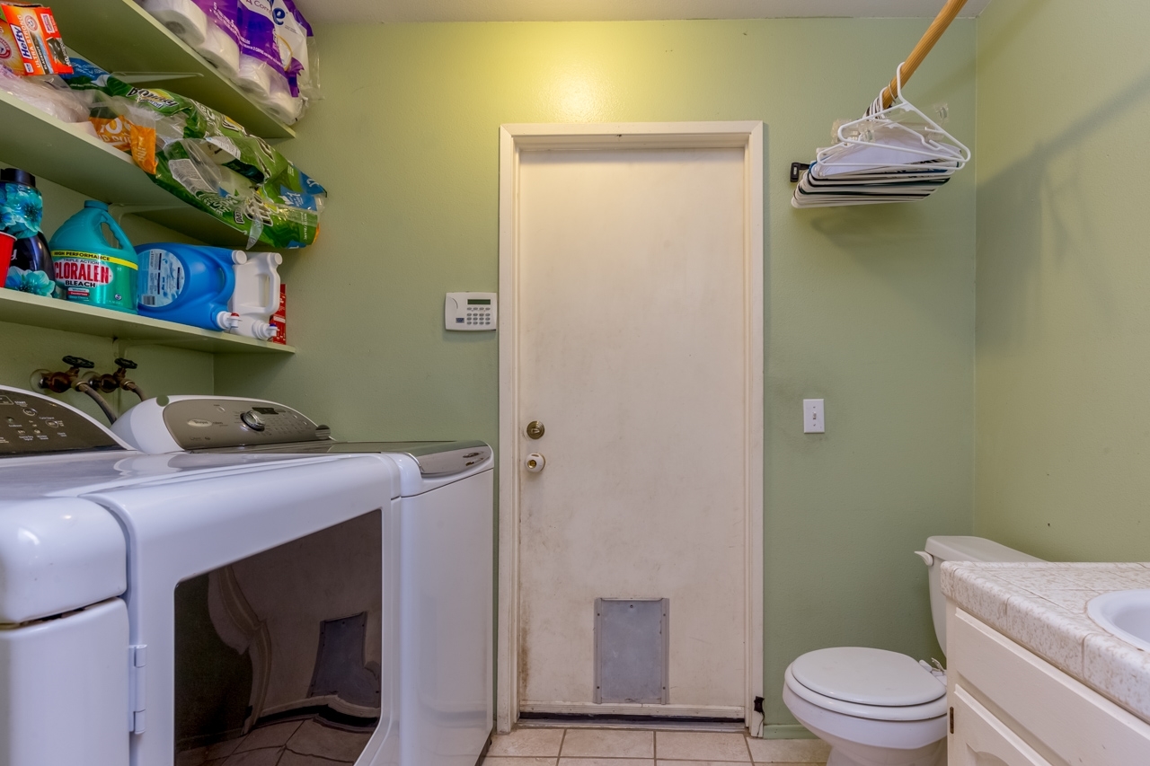 13702 Willow Road Lakeside, CA 92040 - Photo 19 of 24 Laundry room and half bathroom.