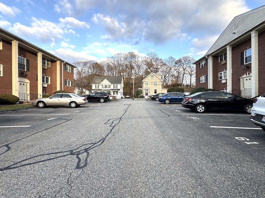 29 Arlington Road, Unit 2 Woburn, MA 01801 - Photo 11 of 11 a view of street with parked cars