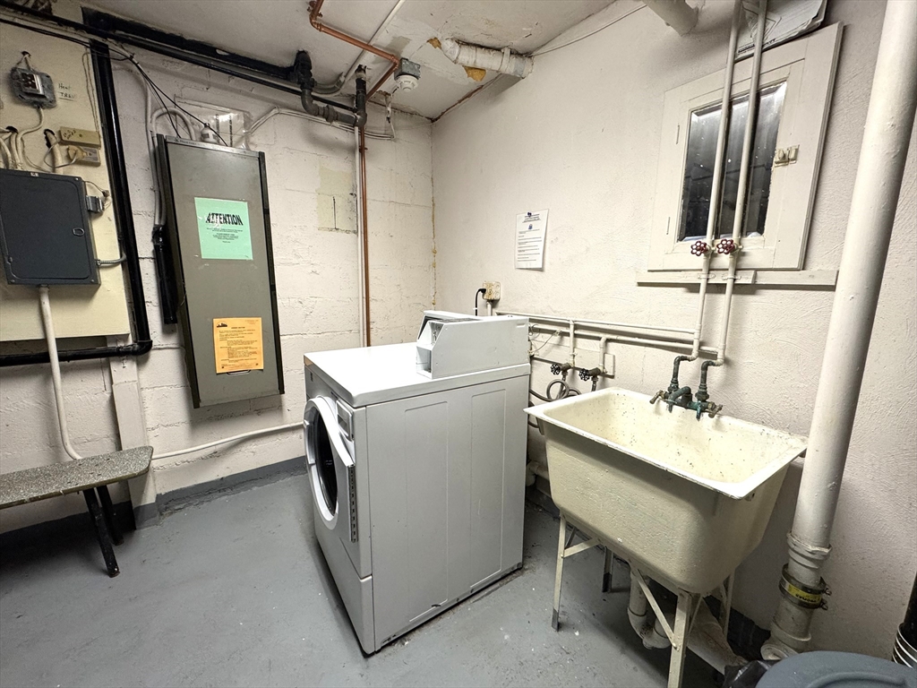 29 Arlington Road, Unit 2 Woburn, MA 01801 - Photo 10 of 11 a utility room with dryer and washer