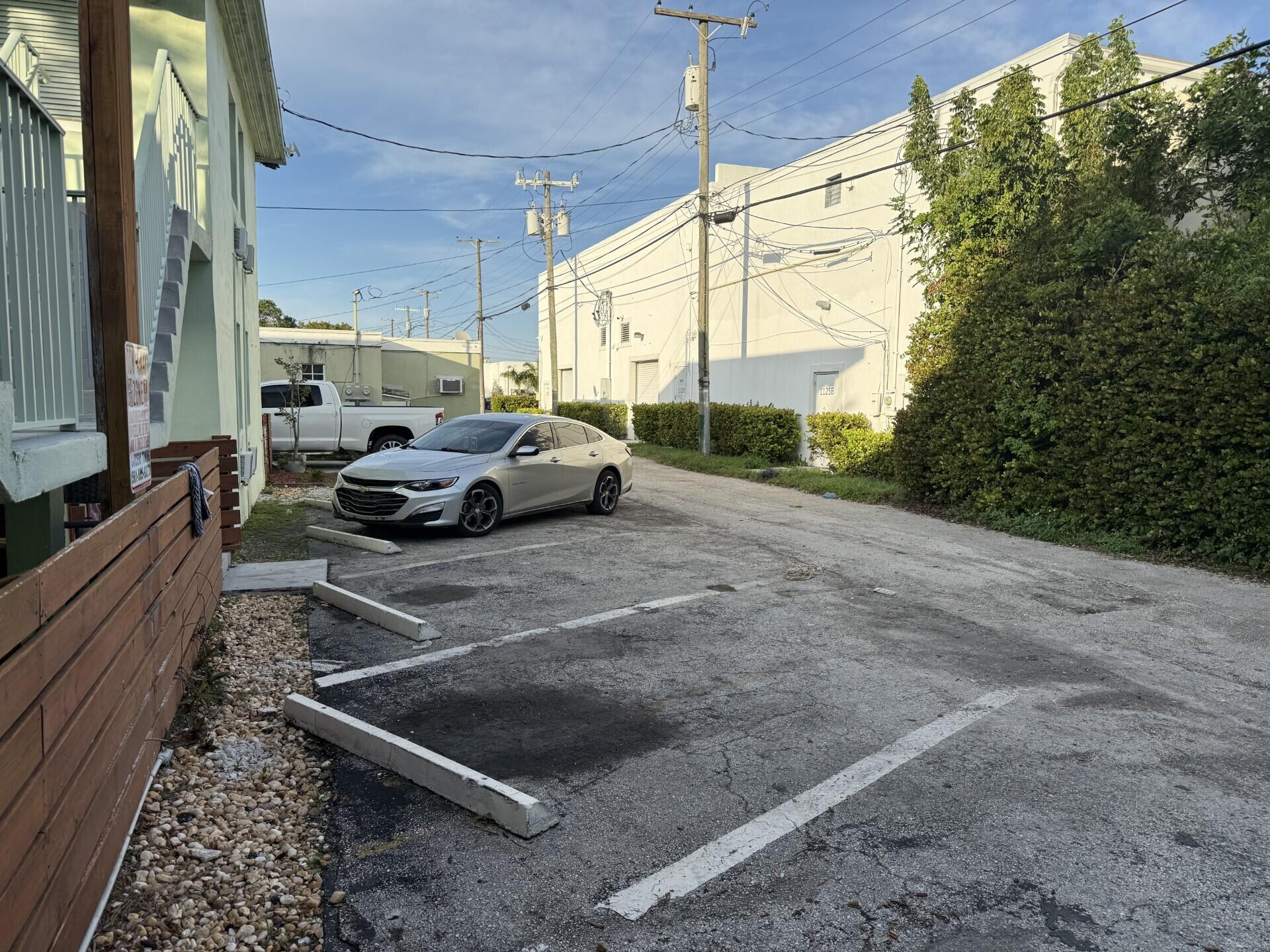 1118 North H Street, Unit 3 Lake Worth Beach, FL 33460 - Photo 11 of 11 a car parked in front of a house