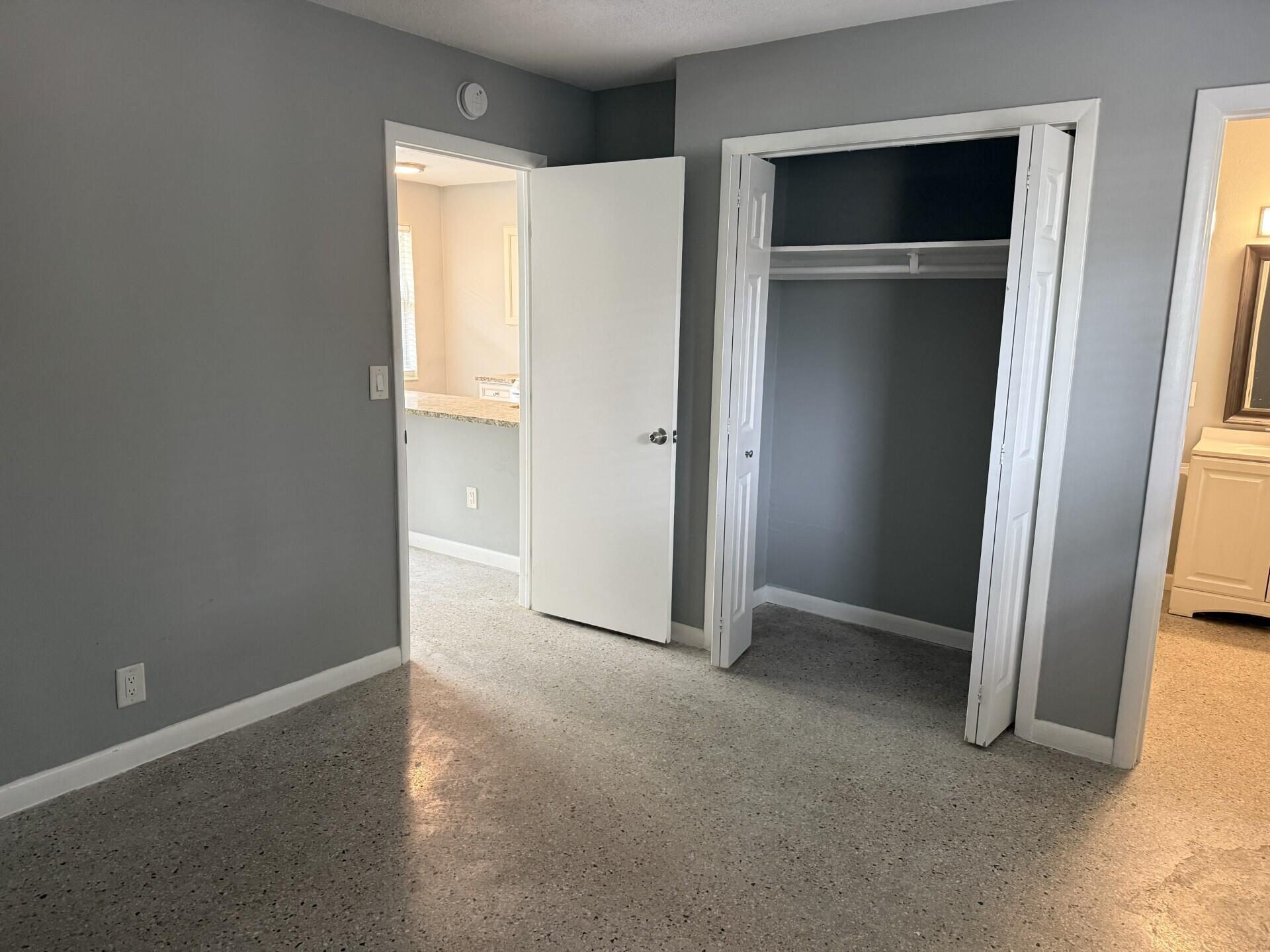 1118 North H Street, Unit 3 Lake Worth Beach, FL 33460 - Photo 5 of 11 a view of an empty room with closet area