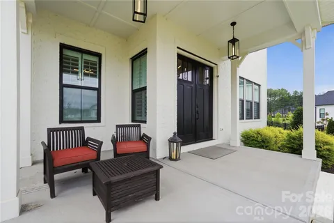 a outdoor living space with furniture and a window