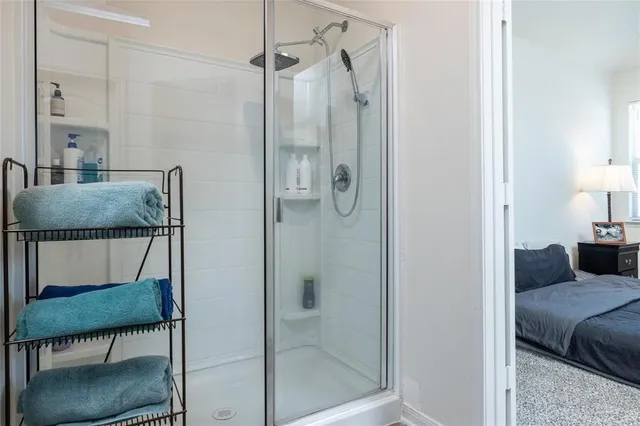 a bedroom with a workspace