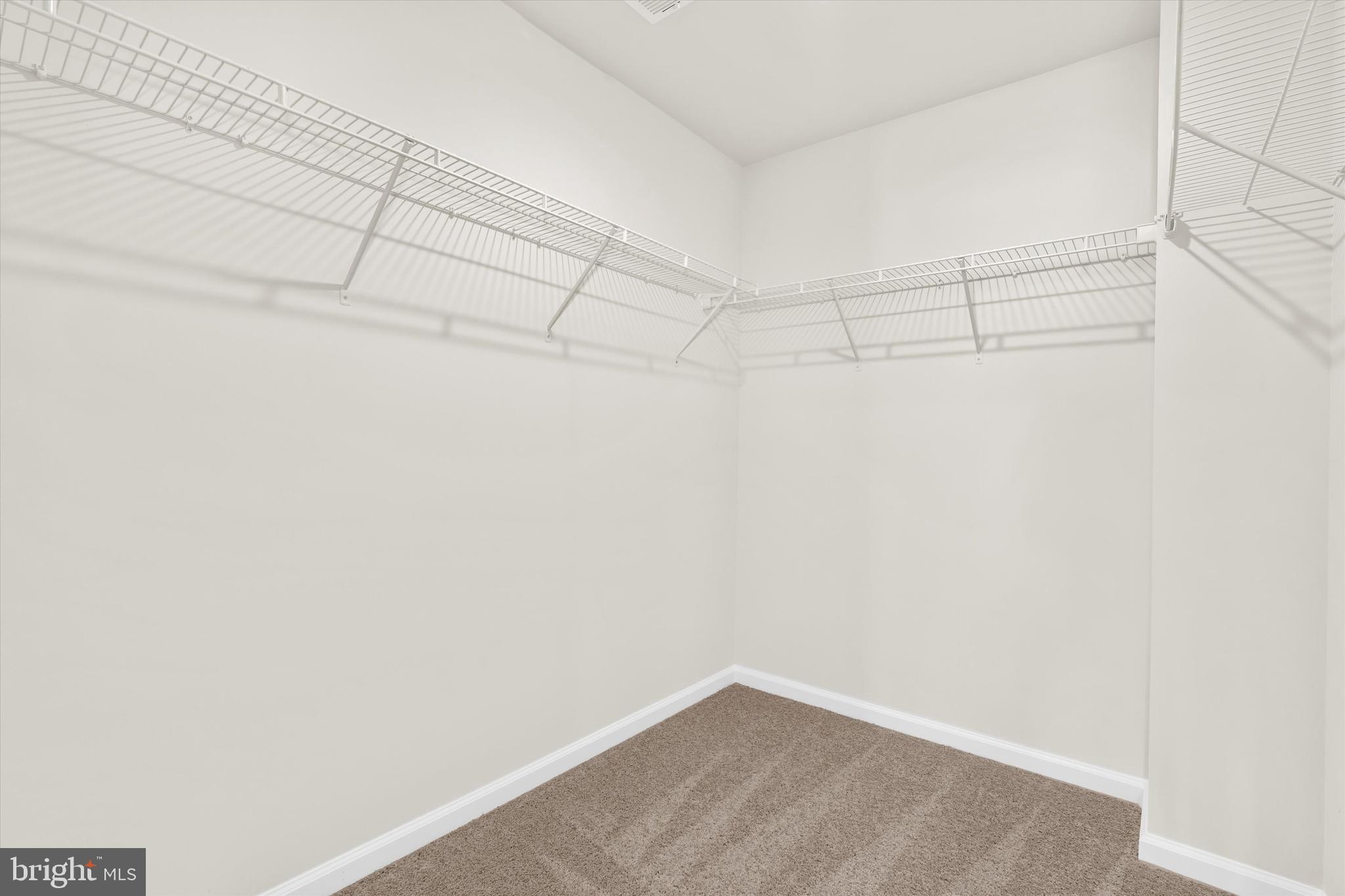 8135 Bartholomew Court Baltimore, MD 21206 - Photo 37 of 46 a view of a room with racks on the wall