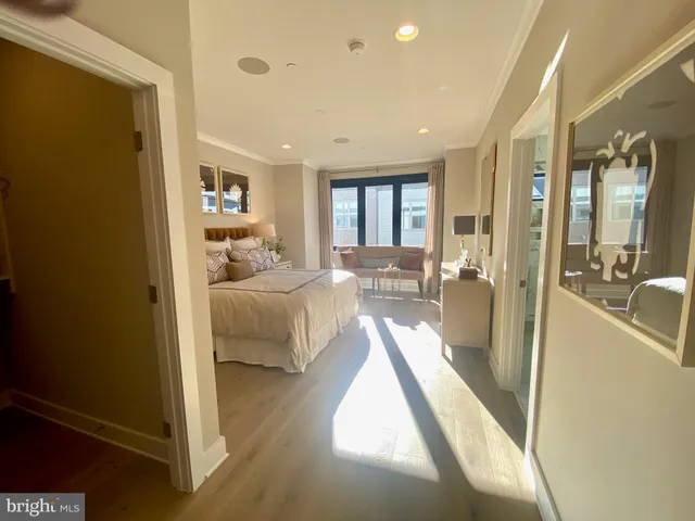 a bedroom with a bed and furniture