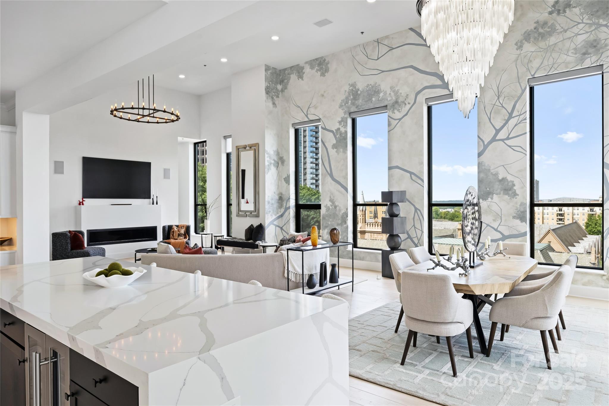 127 North Tryon Street, Unit 615 Charlotte, NC 28246 - Photo 11 of 48 a view of a dining room with furniture
