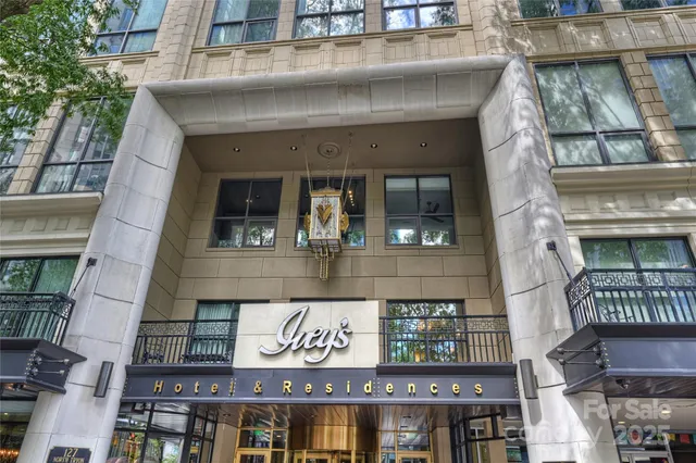 a view of a building with glass windows and door