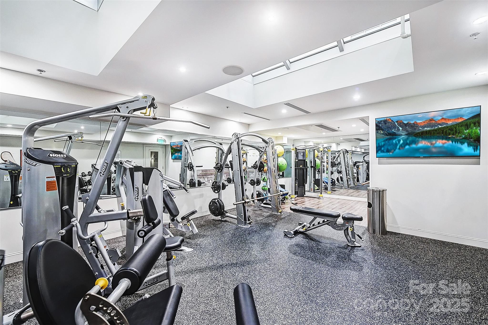 127 North Tryon Street, Unit 615 Charlotte, NC 28246 - Photo 45 of 48 a view of a room with gym equipment
