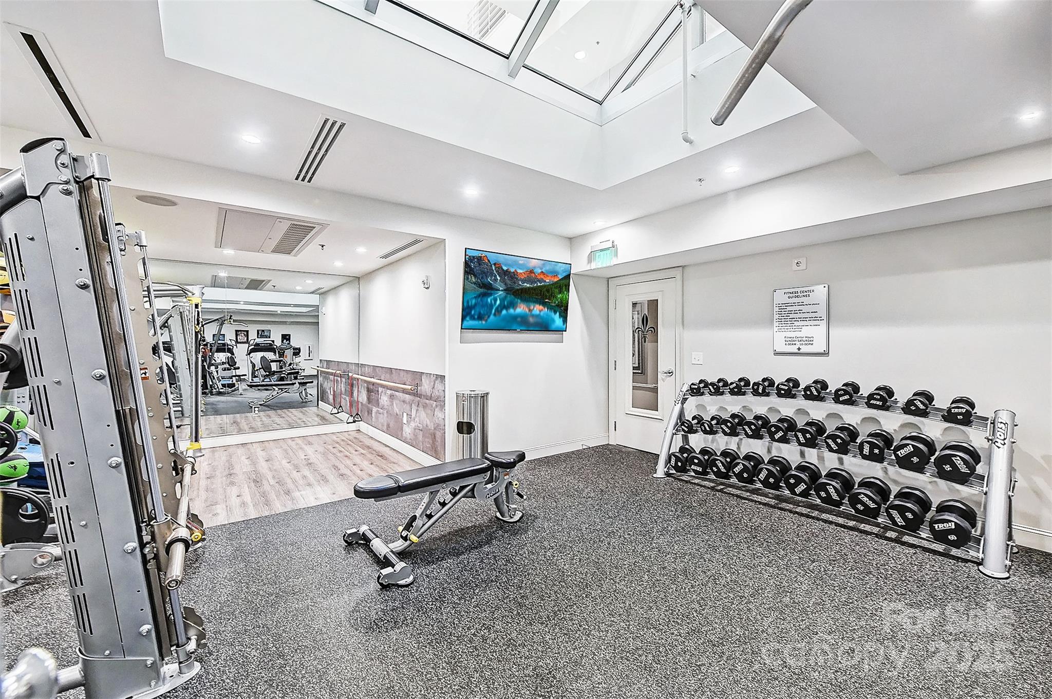 127 North Tryon Street, Unit 615 Charlotte, NC 28246 - Photo 46 of 48 a view of a room with gym equipment