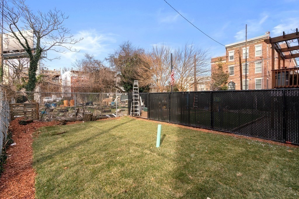 134 Chelsea Street, Unit 1 Boston, MA 02128 - Photo 10 of 13 a view of back yard of the house