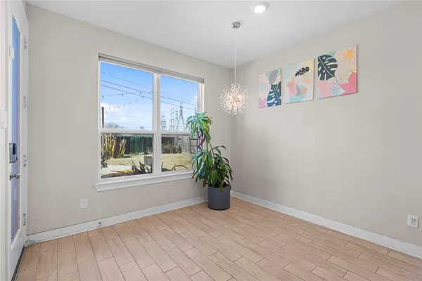 a view of livingroom with furniture and wooden floor