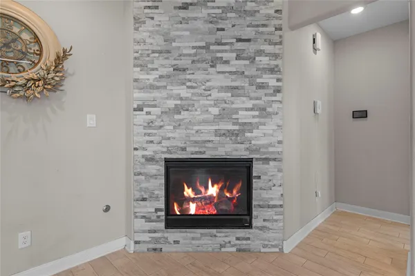 a living room with a fireplace