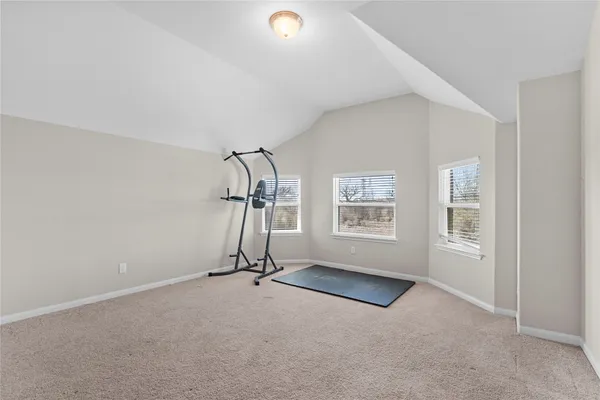 a view of empty room with closet