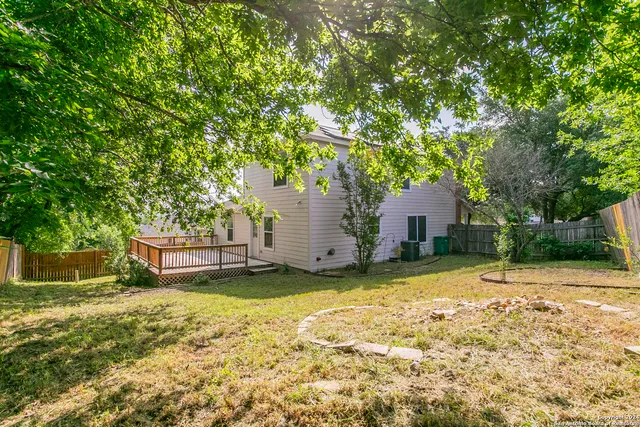 a house with a tree in front of it