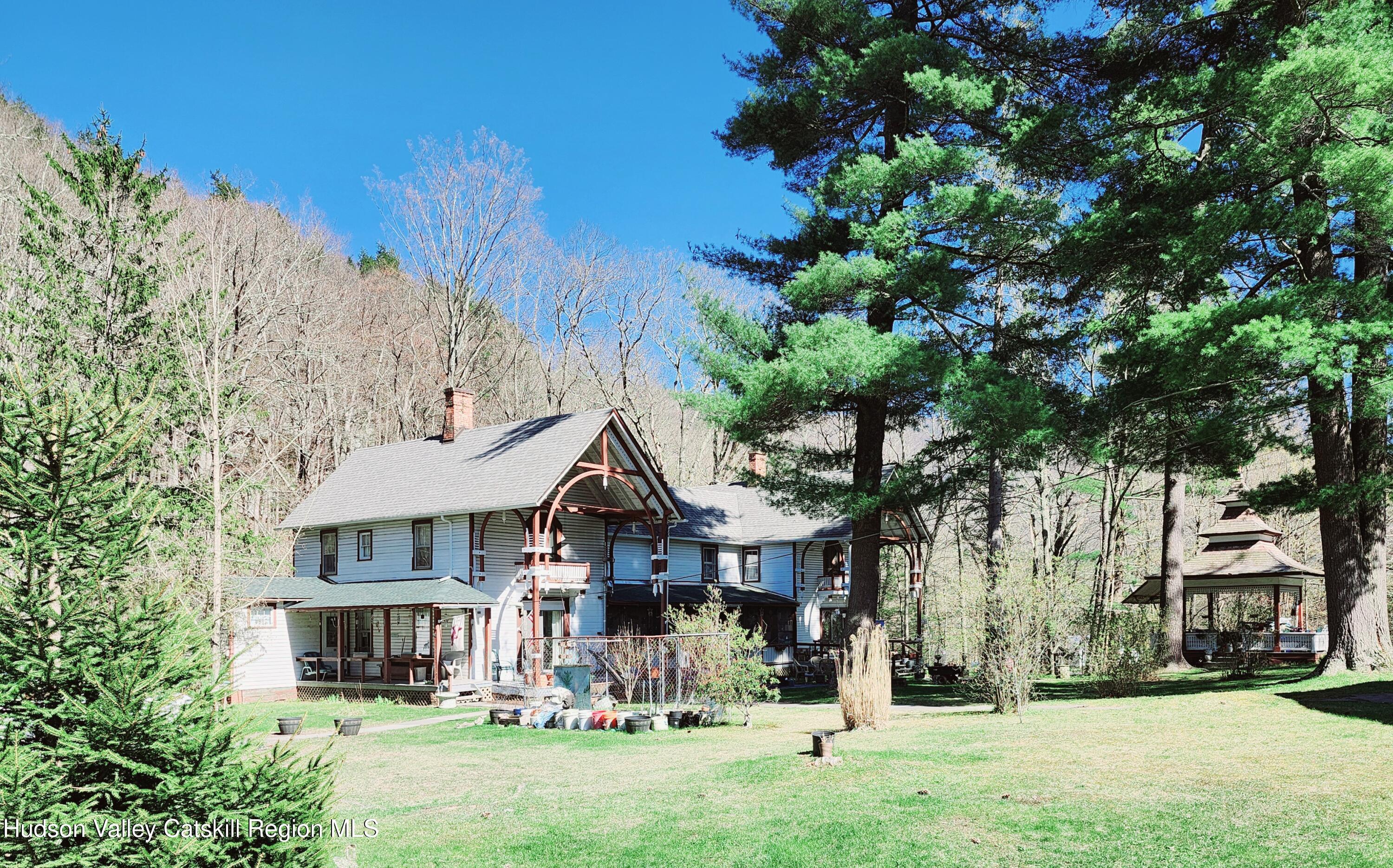 37-69 Mt Ava Maria Road Phoenicia, NY 12464 - Photo 13 of 27 front view of a house with a yard