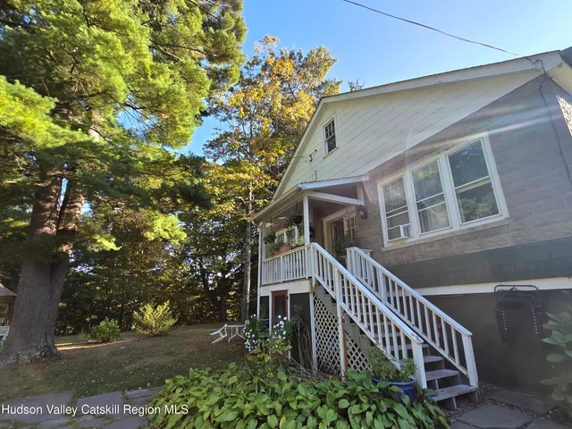 a balcony view with a garden
