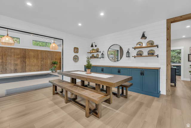 1766 West Tollgate Cyn Road Coalville, UT 84017 - Photo 10 of 59 Spacious dining area featuring wood-finish flooring, shiplap wall finishes, and recessed lighting