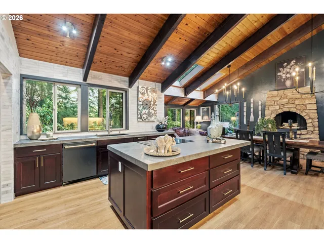a kitchen with a sink and a stove