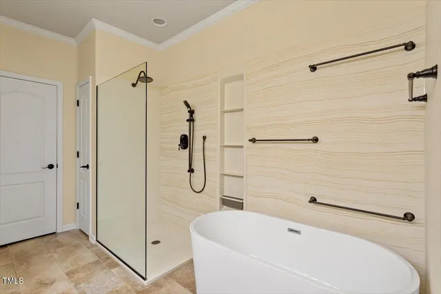 a bathroom with a tub and a shower