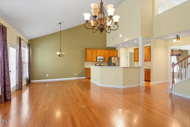 a view of a livingroom with a kitchen