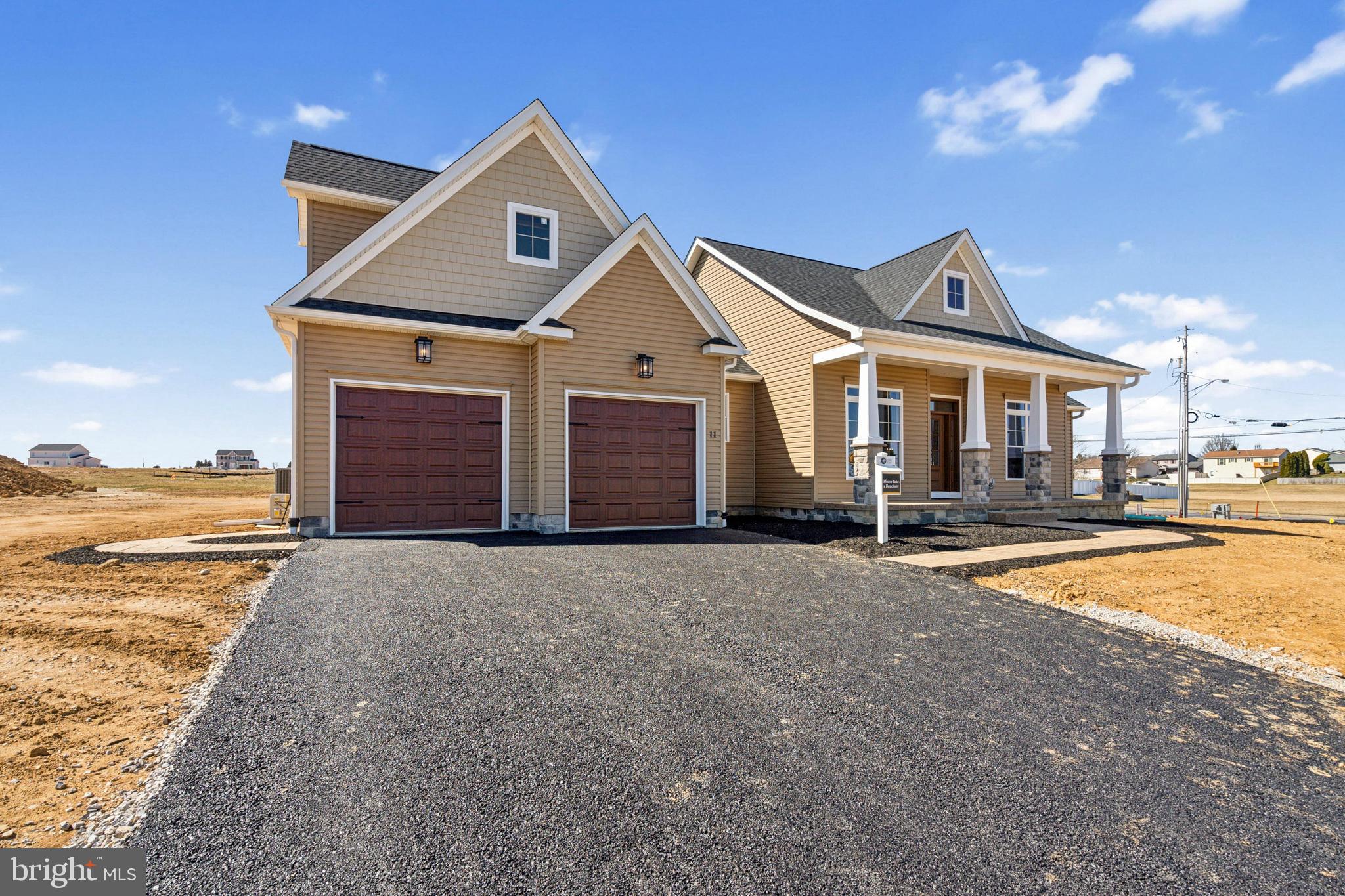 285 Ledger Drive, Unit 61 Hanover, PA 17331 - Photo 2 of 41 a view of a house next to a big yard