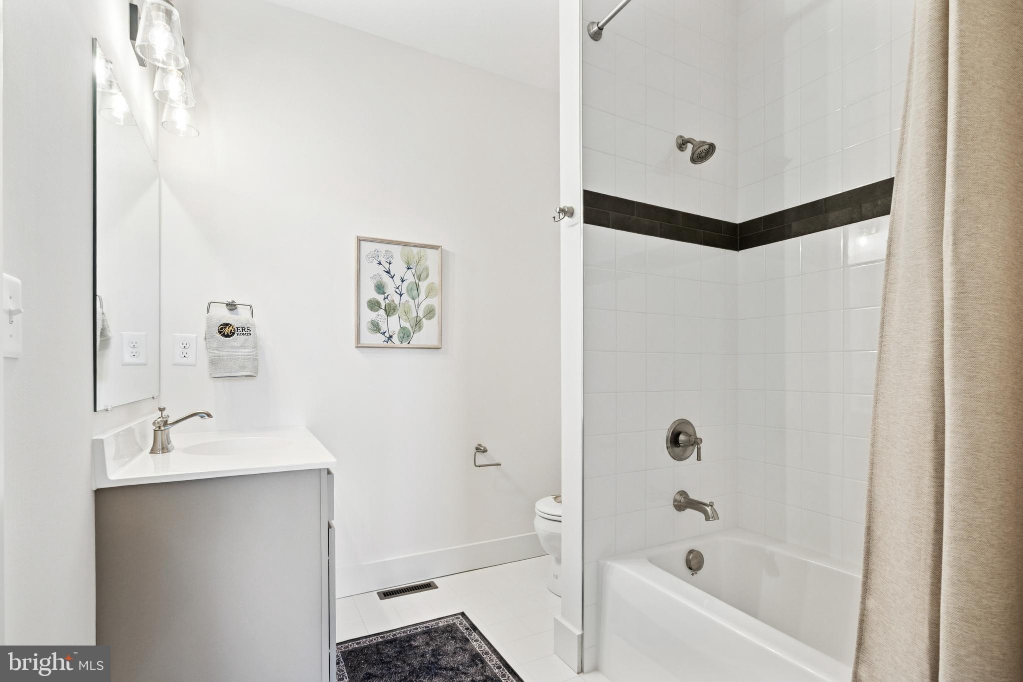 285 Ledger Drive, Unit 61 Hanover, PA 17331 - Photo 26 of 41 a bathroom with a bathtub and a sink