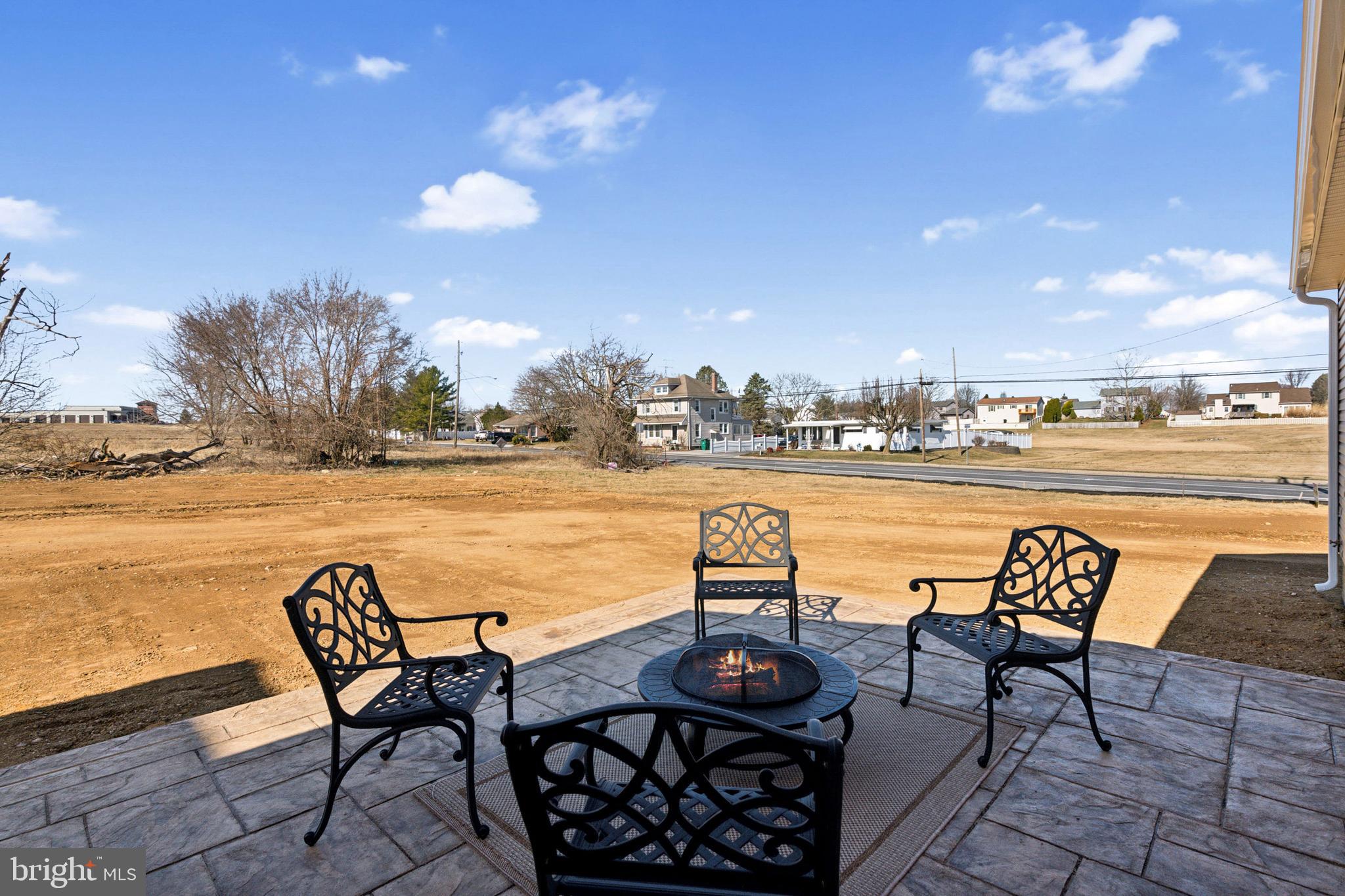 285 Ledger Drive, Unit 61 Hanover, PA 17331 - Photo 38 of 41 a view of a terrace with furniture and city