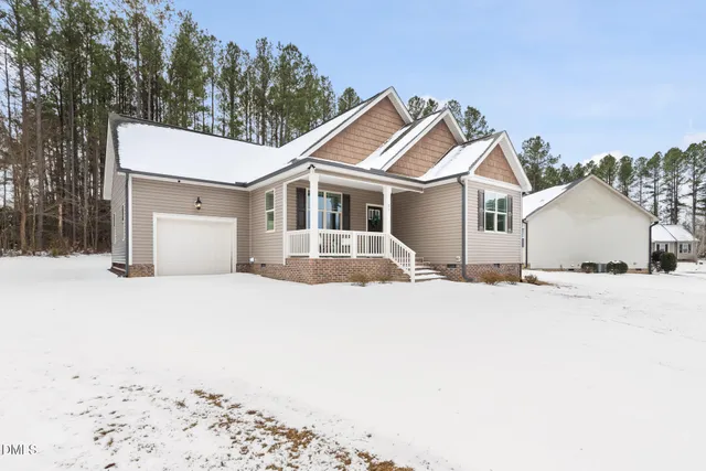 a house with trees in the background
