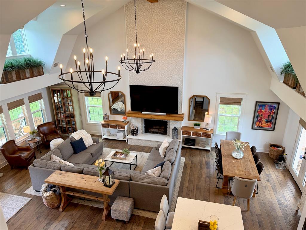 1304 Tinker Road Colleyville, TX 76034 - Photo 5 of 28 a living room with furniture or chandelier and a flat screen tv