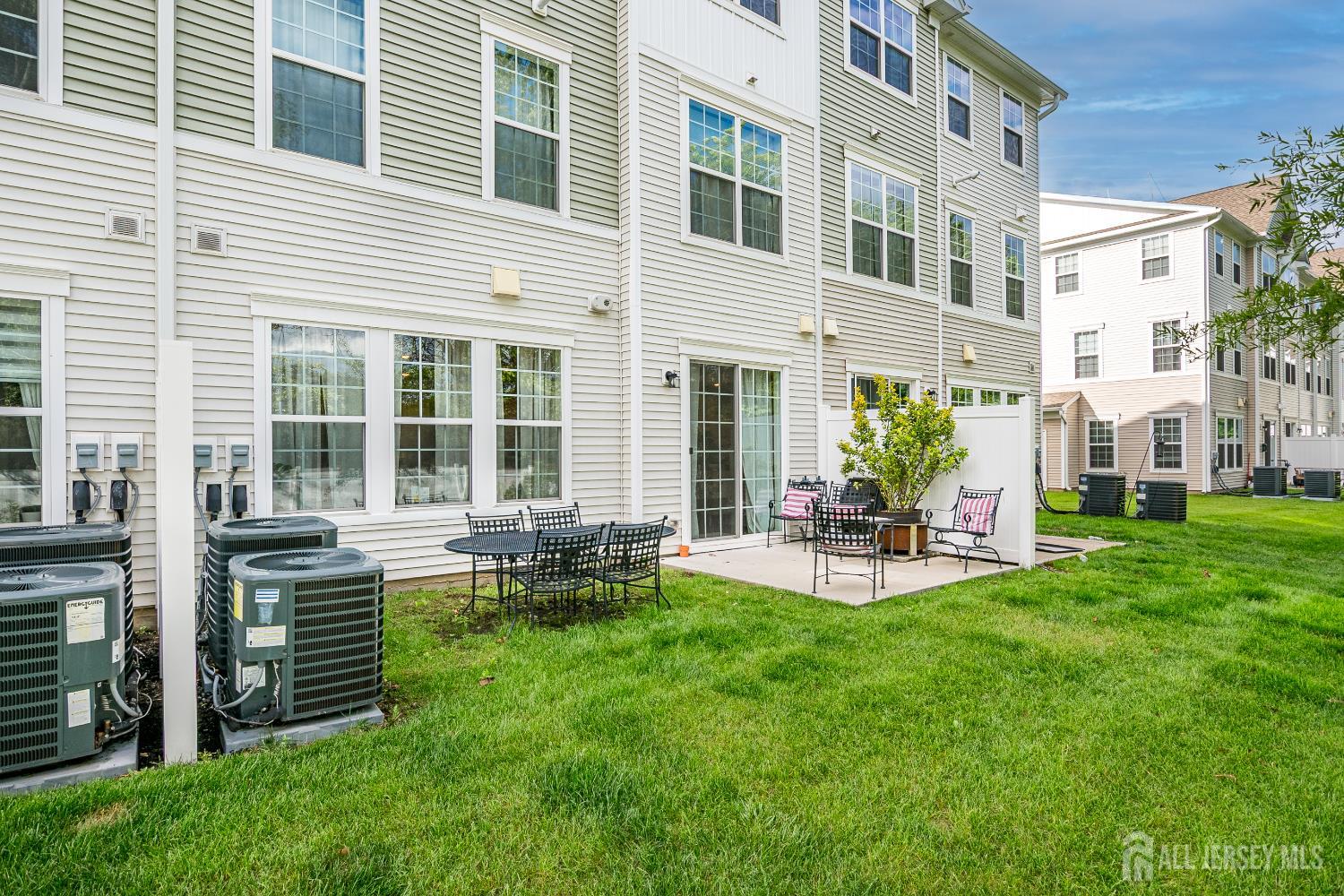 224 Park Lane Dunellen, NJ 08812 - Photo 29 of 40 a view of a house with a yard and sitting area
