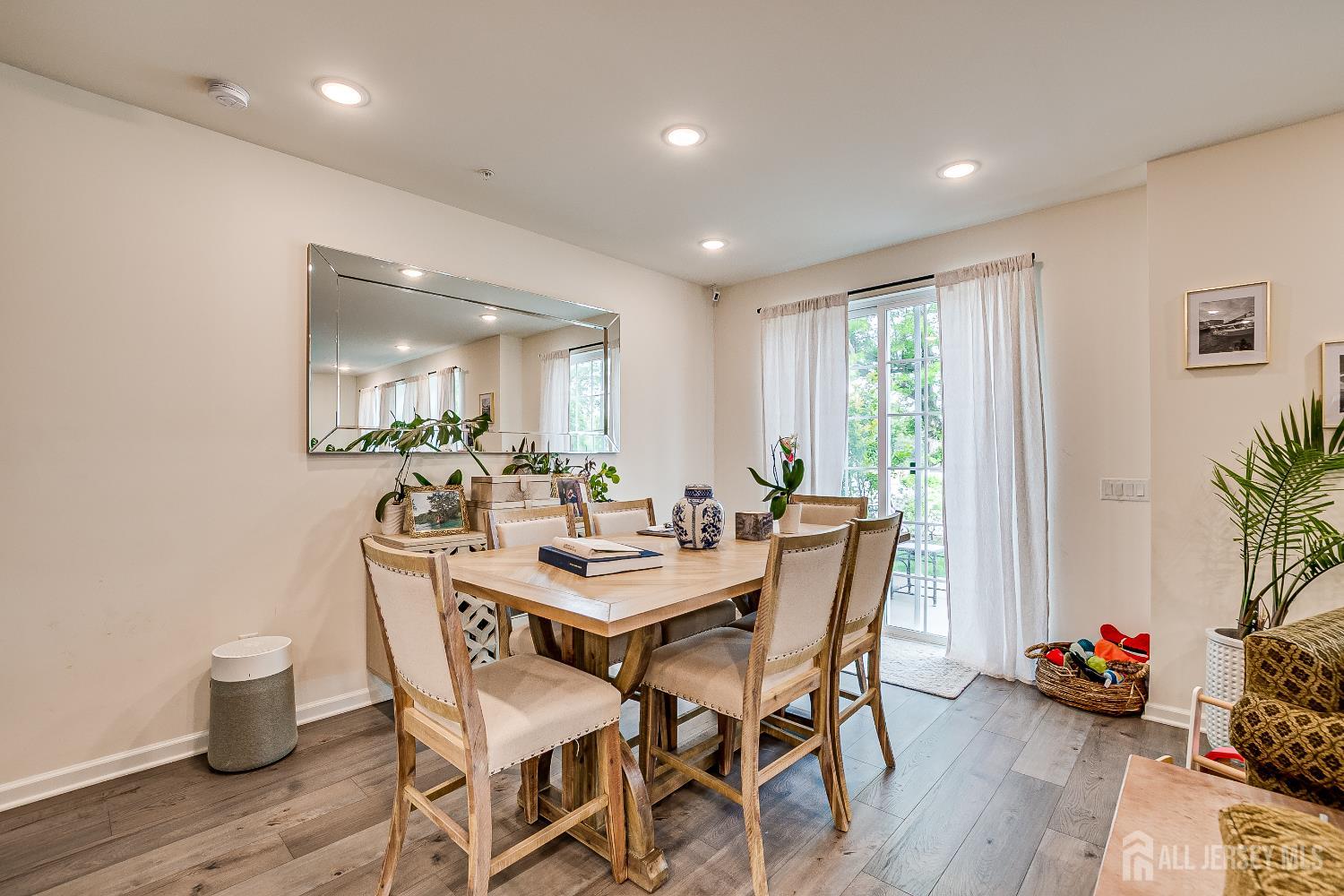 224 Park Lane Dunellen, NJ 08812 - Photo 10 of 40 a view of a dining room with furniture and wooden floor