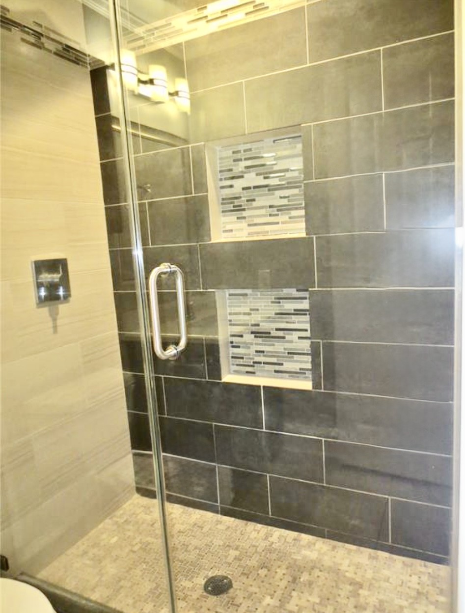 8214 Split Oak Drive Houston, TX 77040 - Photo 11 of 15 a bathroom with a shower