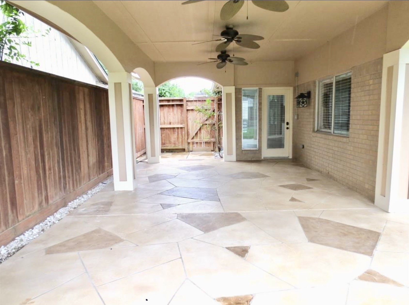 8214 Split Oak Drive Houston, TX 77040 - Photo 13 of 15 a view of a hall with a flat screen tv